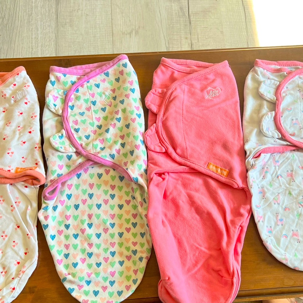 Swaddle Me baby girl size small/medium swaddles. Used-good condition.